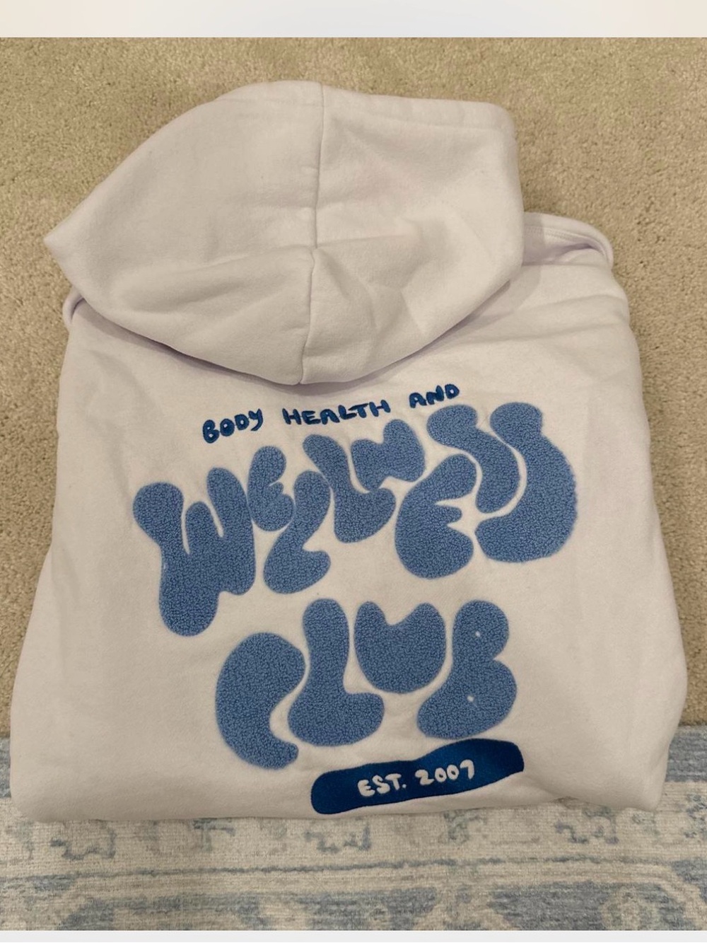 White Hoodie with Blue 'Wellness Club' Chenille Graphic